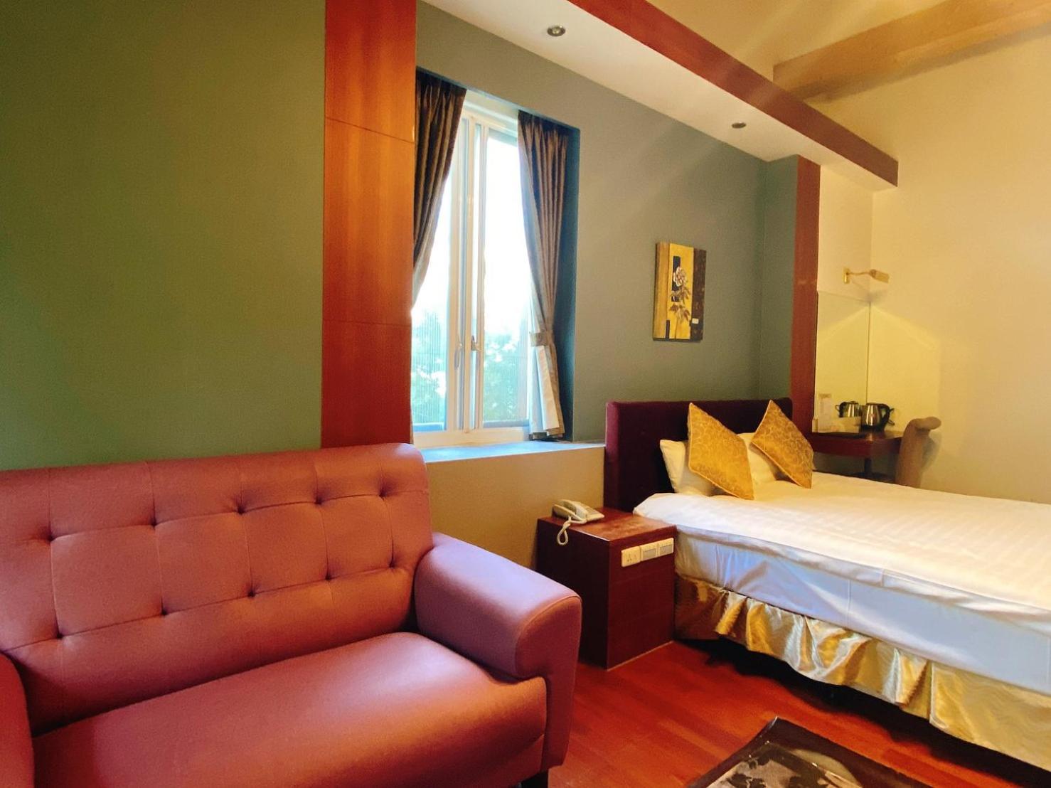 Ailiga Travel Villa Renai Rum bild