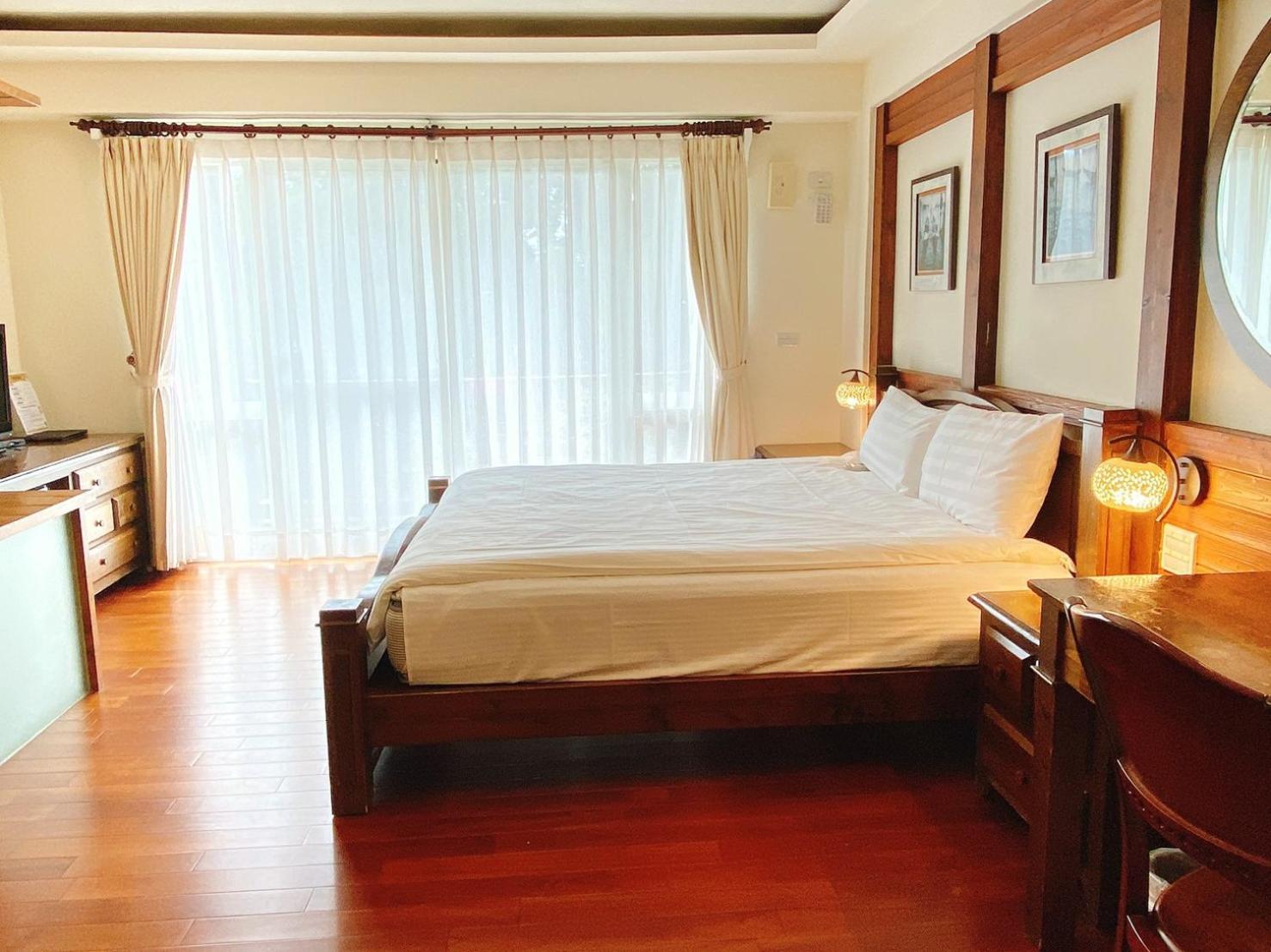 Ailiga Travel Villa Renai Rum bild