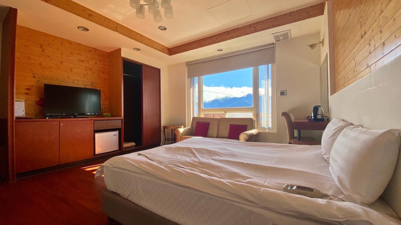 Ailiga Travel Villa Renai Rum bild